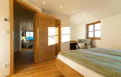 Ein Bett oder Betten in einem Zimmer der Unterkunft Lenzlhof