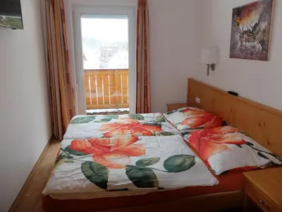 Ein Bett oder Betten in einem Zimmer der Unterkunft Obertauern Fewo Freya Top 4 by Kamper