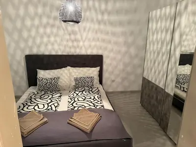 Ein Bett oder Betten in einem Zimmer der Unterkunft Ferienwohnung Bischofshofen