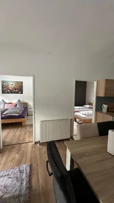 Ein Bett oder Betten in einem Zimmer der Unterkunft Ferienwohnung Casa Amedea