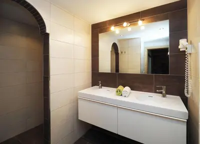 Ein Badezimmer in der Unterkunft Lürzergut