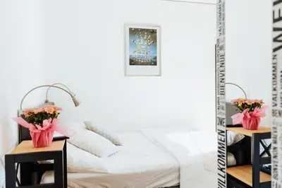 Ein Bett oder Betten in einem Zimmer der Unterkunft ArVia Living - Ferienwohnung in Altmünster, zentrale Lage, 7 Min Gehweg zum Traunsee, Küche, gratis Parkplatz & WLAN