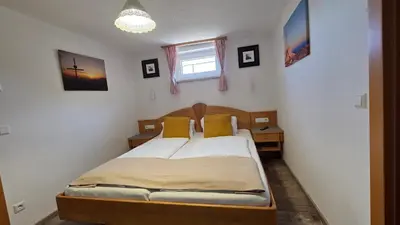 Ein Bett oder Betten in einem Zimmer der Unterkunft Haus Tauernseitn