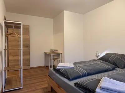 Ein Bett oder Betten in einem Zimmer der Unterkunft Ski und Wander Ferienwohnung Galsterberg-Blick Pruggern - Schladming-Dachstein