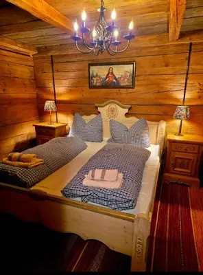 Ein Bett oder Betten in einem Zimmer der Unterkunft Augihütte