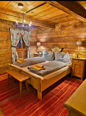 Ein Bett oder Betten in einem Zimmer der Unterkunft Schffenbichl Hütte