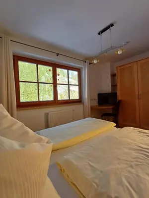 Ein Bett oder Betten in einem Zimmer der Unterkunft Biobauernhof Appartement Oberreith