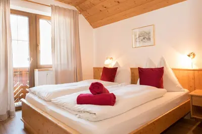 Ein Bett oder Betten in einem Zimmer der Unterkunft Ferienwohnungen Schwalbennest