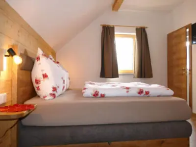 Ein Bett oder Betten in einem Zimmer der Unterkunft Holiday home in Salzburg with sauna