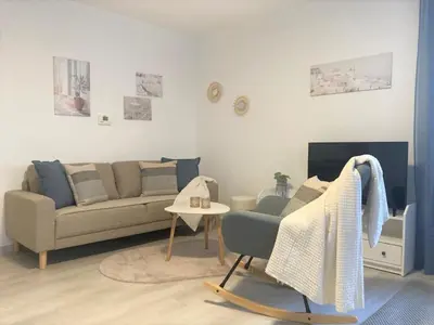 Ein Sitzbereich in der Unterkunft Ferienwohnung im Zentrum mit Parkplatz