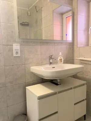 Ein Badezimmer in der Unterkunft Ferienwohnung im Zentrum mit Parkplatz