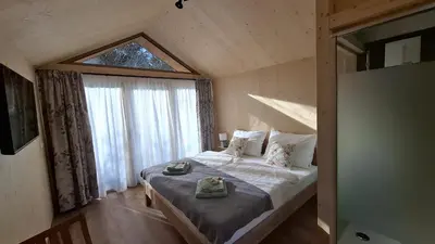 Ein Bett oder Betten in einem Zimmer der Unterkunft Tiny House
