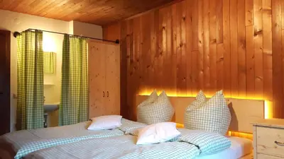 Ein Bett oder Betten in einem Zimmer der Unterkunft Almhaus Grubhof