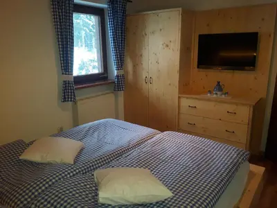 Ein Bett oder Betten in einem Zimmer der Unterkunft Almhaus Grubhof