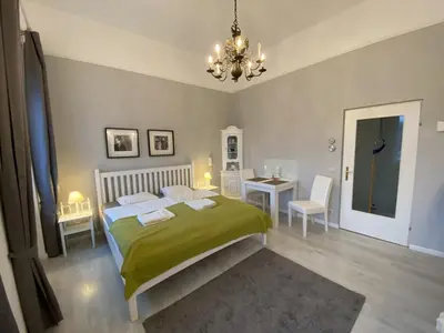 Ein Bett oder Betten in einem Zimmer der Unterkunft Seeblickperle in Gmunden Zentrum, Hauptplatz