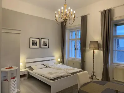 Ein Bett oder Betten in einem Zimmer der Unterkunft SEEPERLE am See