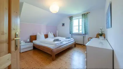 Ein Bett oder Betten in einem Zimmer der Unterkunft Villa Bellevue Altaussee