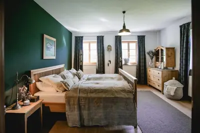 Ein Bett oder Betten in einem Zimmer der Unterkunft Landhaus am Fuschlsee