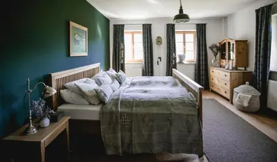 Ein Bett oder Betten in einem Zimmer der Unterkunft Landhaus am Fuschlsee