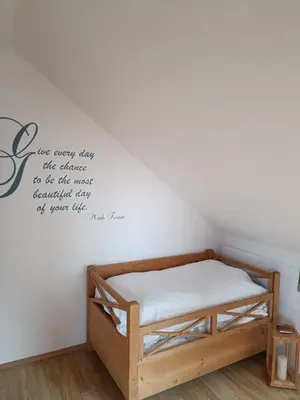 Ein Bett oder Betten in einem Zimmer der Unterkunft Ferienwohnung am Traunsee