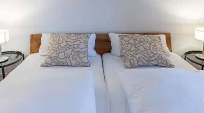 Ein Bett oder Betten in einem Zimmer der Unterkunft Ferienwohnung im Ötzergut - Your Austrian Home