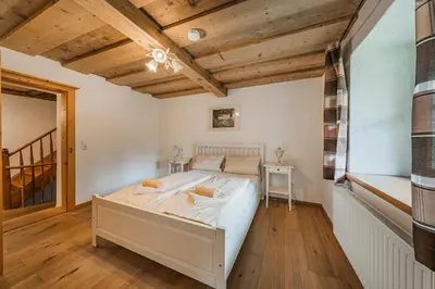 Ein Bett oder Betten in einem Zimmer der Unterkunft Dachstein Chalet Goisern