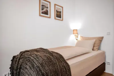 Ein Bett oder Betten in einem Zimmer der Unterkunft Apartment Bergblick