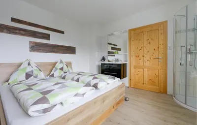 Ein Bett oder Betten in einem Zimmer der Unterkunft Gemuetliches Ferienhaus