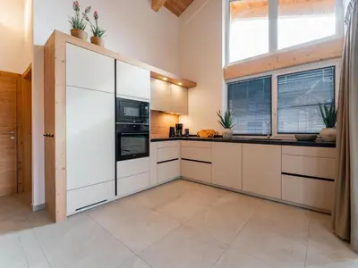 Küche/Küchenzeile in der Unterkunft Grebenzen Lodges 49B