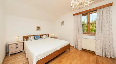 Ein Bett oder Betten in einem Zimmer der Unterkunft Haus Seegarten by Landluft