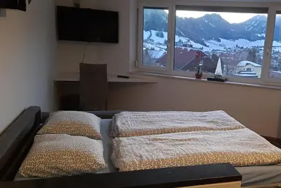 Ein Bett oder Betten in einem Zimmer der Unterkunft Panoramatraum