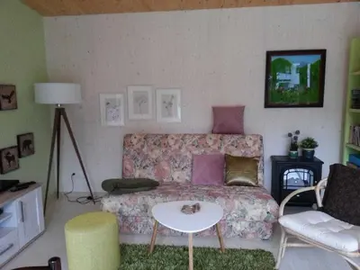 Ein Sitzbereich in der Unterkunft Blum - vom Ende Comfortable holiday residence