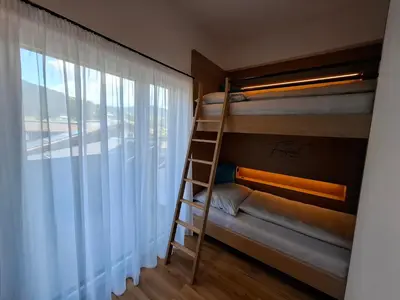 Ein Etagenbett oder Etagenbetten in einem Zimmer der Unterkunft Das Freigeist