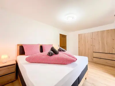 Ein Bett oder Betten in einem Zimmer der Unterkunft Sunnyside Mountain Chalet