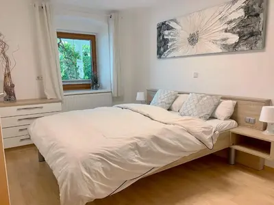 Ein Bett oder Betten in einem Zimmer der Unterkunft Cozy 2 Bed