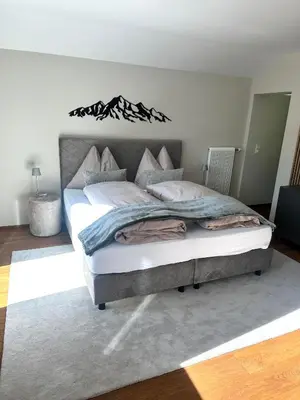 Ein Bett oder Betten in einem Zimmer der Unterkunft Ferienhaus Mützenzauber