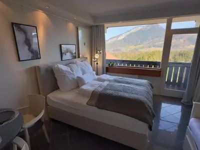 Ein Bett oder Betten in einem Zimmer der Unterkunft Bergträumerei