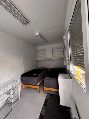 Ein Bett oder Betten in einem Zimmer der Unterkunft Möbilierter Wohncontainer für bis zu 2 Personen in der Gemeinde Rutzenham