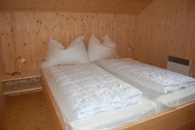 Ein Bett oder Betten in einem Zimmer der Unterkunft Chalet Sonnenschein