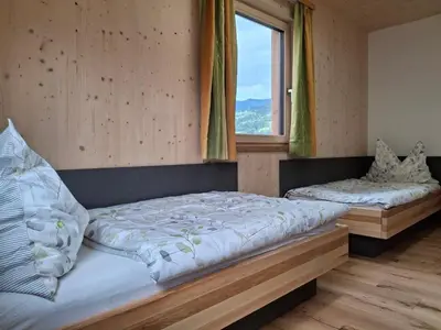 Ein Bett oder Betten in einem Zimmer der Unterkunft Grafnhof
