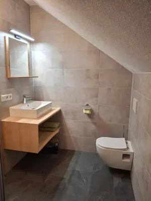 Ein Badezimmer in der Unterkunft Grafnhof