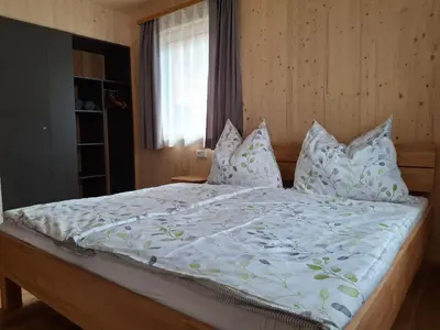 Ein Bett oder Betten in einem Zimmer der Unterkunft Grafnhof