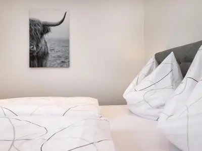 Ein Bett oder Betten in einem Zimmer der Unterkunft Apartment Bergblick by Interhome