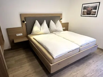 Ein Bett oder Betten in einem Zimmer der Unterkunft The HIDDEN Apartment