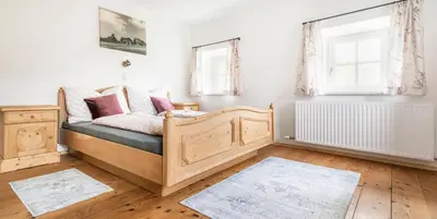 Ein Bett oder Betten in einem Zimmer der Unterkunft Ferienhaus Oberpremgut
