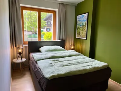 Ein Bett oder Betten in einem Zimmer der Unterkunft Salzkammergut Hideaway RUDOLPH