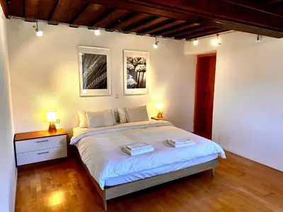 Ein Bett oder Betten in einem Zimmer der Unterkunft Garden Chalet - Lakes & Peaks - Scharnstein