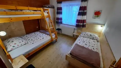 Ein Bett oder Betten in einem Zimmer der Unterkunft Urlaub am Bauernhof Gänser