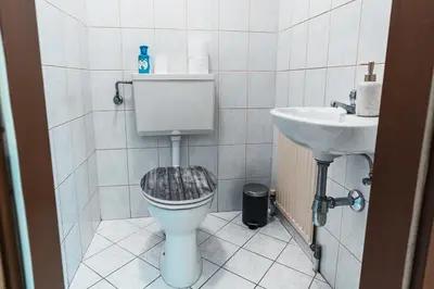 Ein Badezimmer in der Unterkunft Zentral am Fluss #1