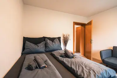 Ein Bett oder Betten in einem Zimmer der Unterkunft Zentral am Fluss #2